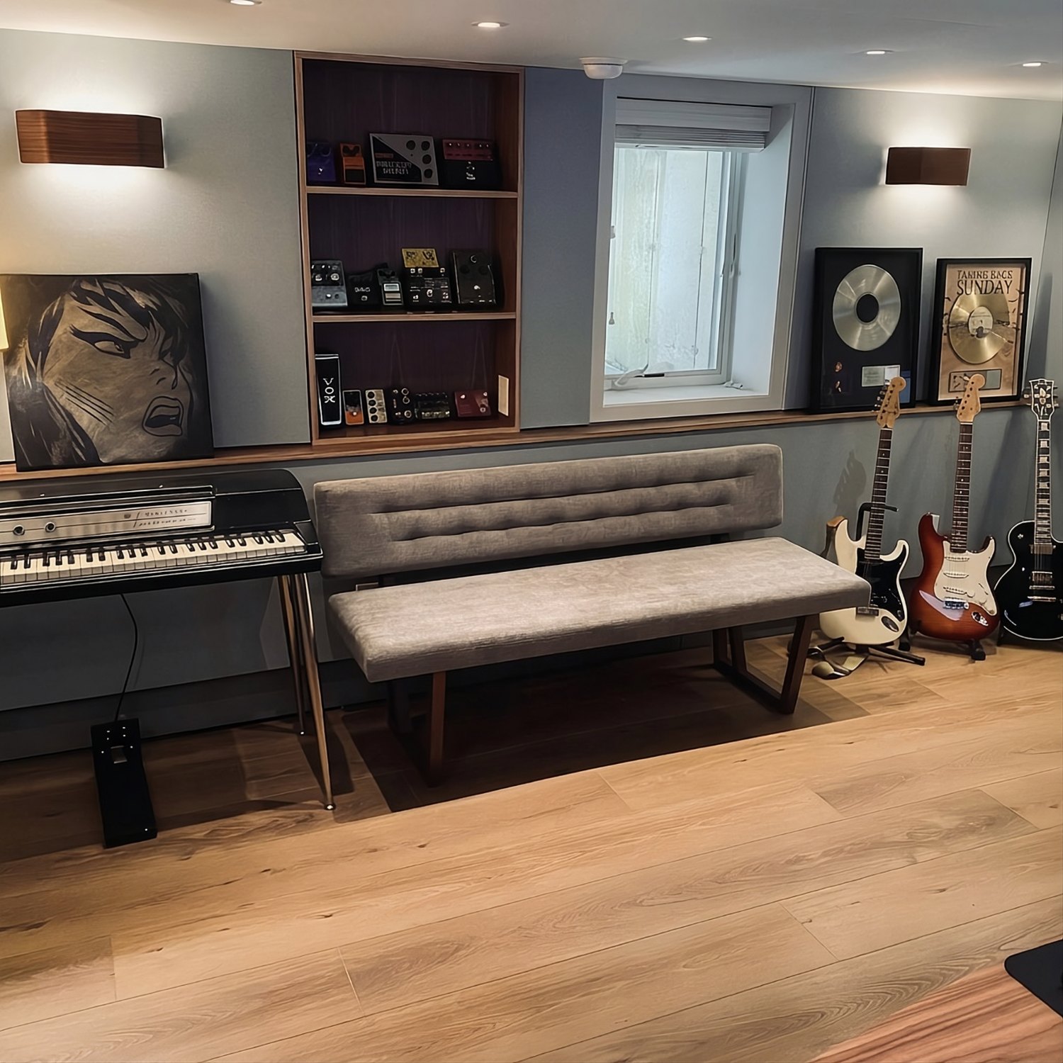 Jamie Siegel's studio — Rhodes piano, pedal shelves, platinum plaques and guitars